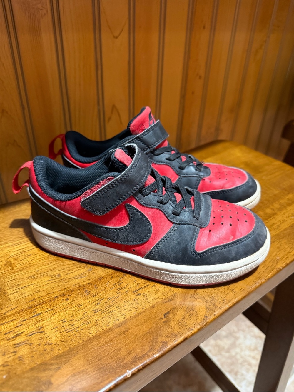 Boys black/red Nike Dunks. Size 13! Still good condition and lots of life left!